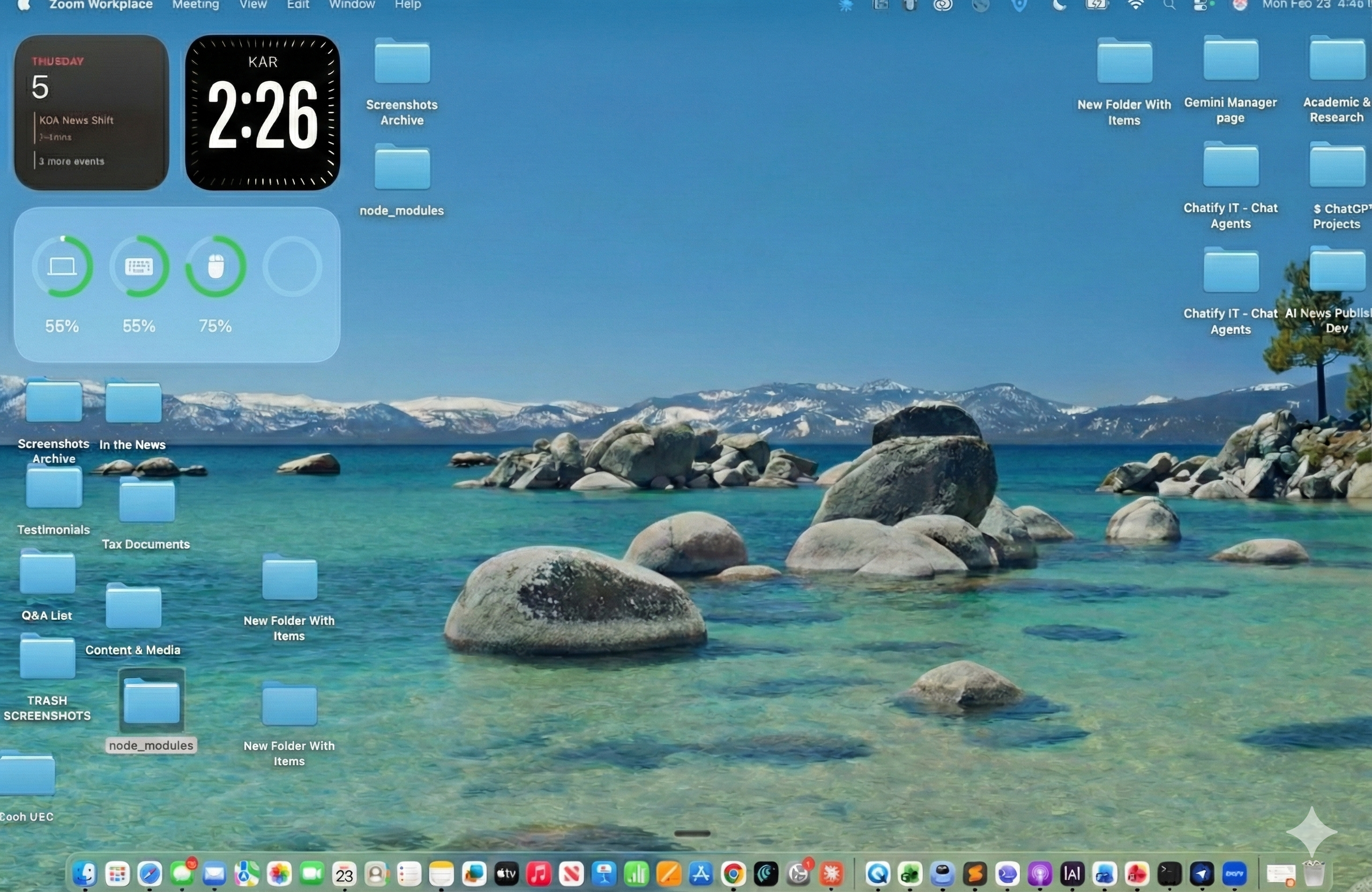 Organized desktop after Claude Cowork cleanup — files sorted into labeled folders like Screenshots Archive, Tax Documents, Content and Media, and Academic Research